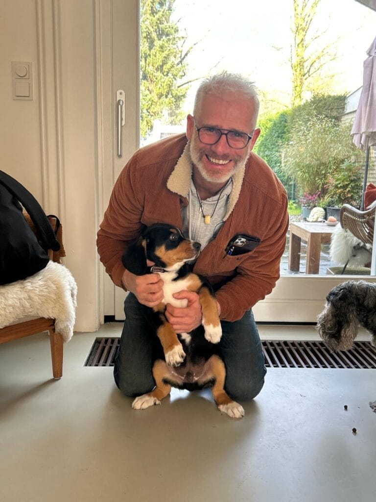 Man met Entlebucher sennenhond